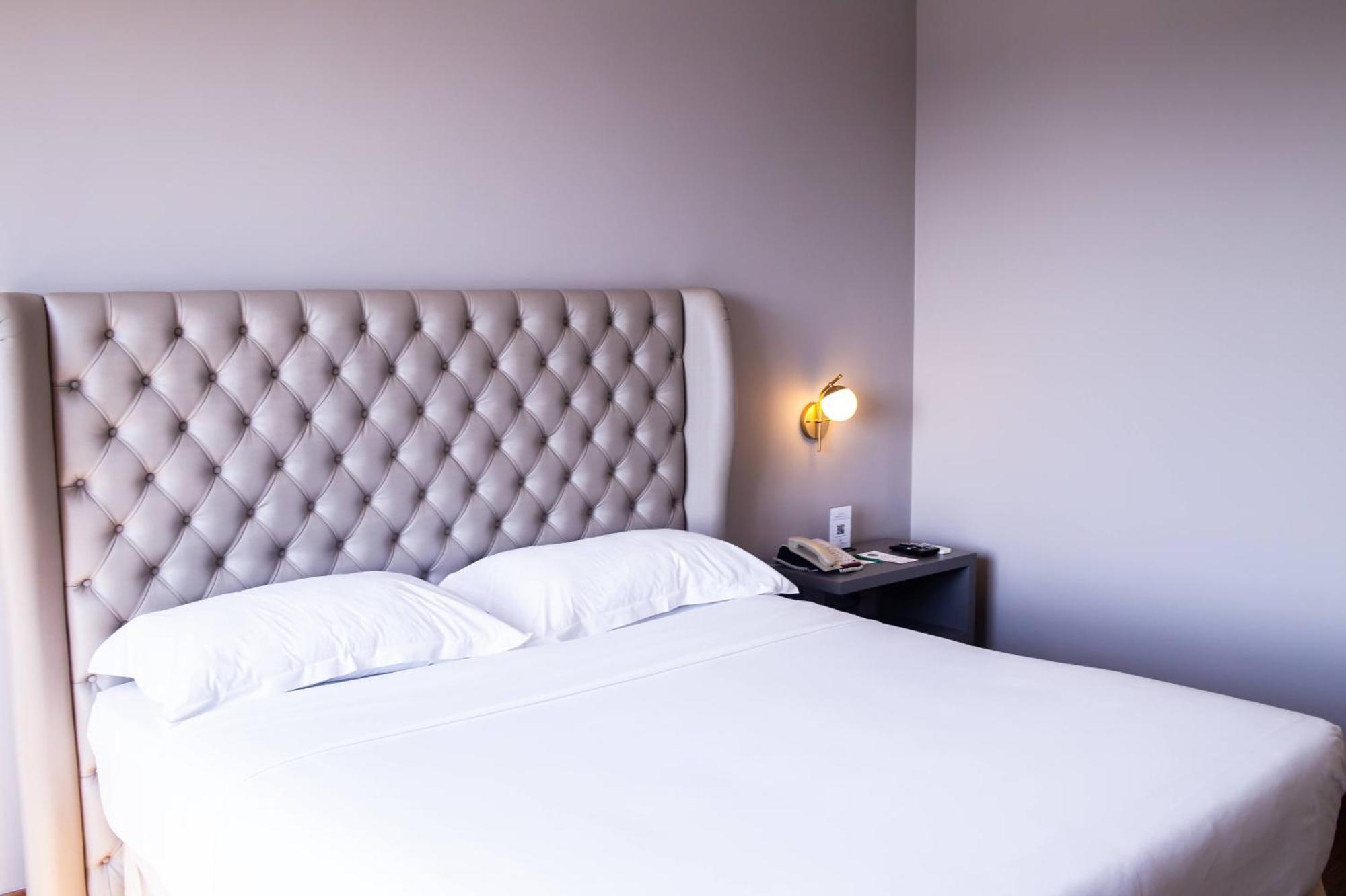 オウロ ミナス パレス ホテル ベロ・オリゾンテ エクステリア 写真 A bedroom at the hotel