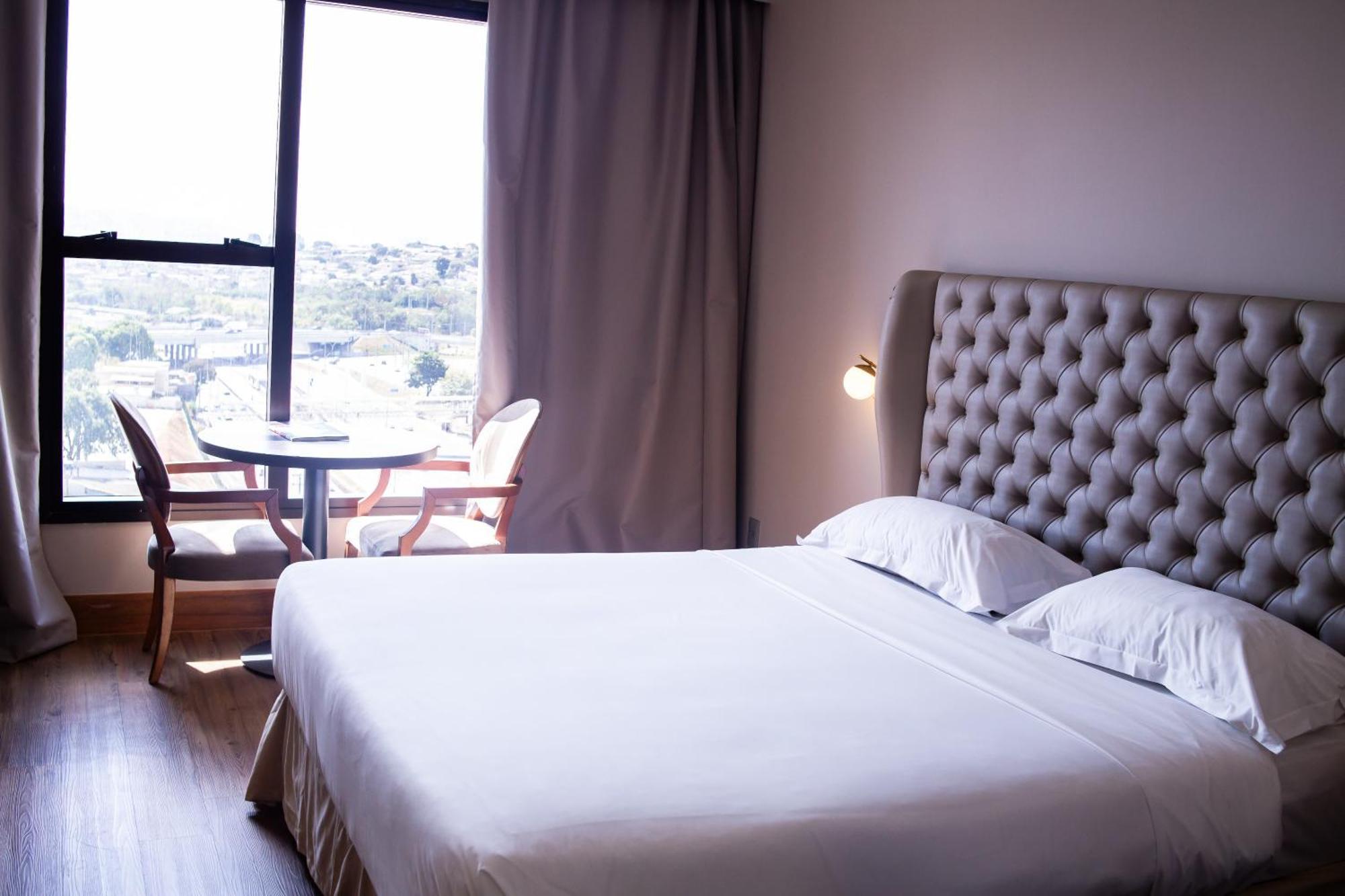 オウロ ミナス パレス ホテル ベロ・オリゾンテ エクステリア 写真 A bedroom at the hotel